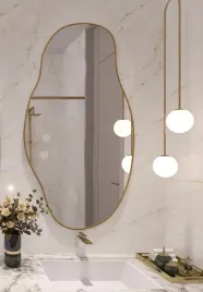asymetryczne-lustro-scienne-75x40cm-w-gold-zlota-ramie