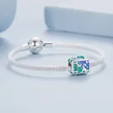 charms-walizka-material-srebro
