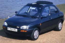 mazda-121-blotnik-lewy-przod-z-otworem-na-kierunkowskaz-1990-1996-oryginal