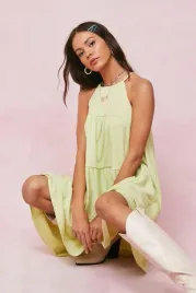 kc51114-nasty-gal-trapezowa-sukienka-mini-z-falbanka-18-xs