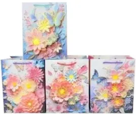 torba-prezentowa-3d-merkpol-mix-wzorow-kwiaty-motyle-pastel-260x411-mm