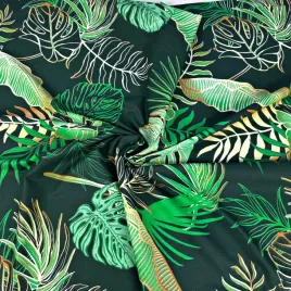 bawelna-100percent-liscie-monstera-i-bananowca-z-kwiatami-na-zielonym-tle
