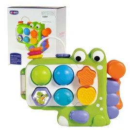 zabawka-sensoryczna-dla-niemowlat-sorter-ksztaltow-dinozaur-interaktywna