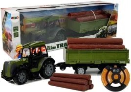 nd24-8433-zielony-traktor-z-przyczepa-belami-drew