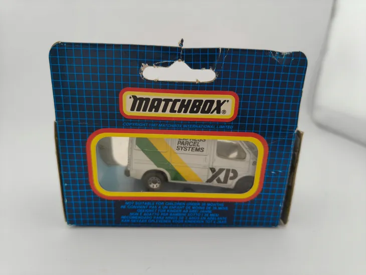 mb60-matchbox-ford-transit-xp-blue-grid-box-stan-nowy