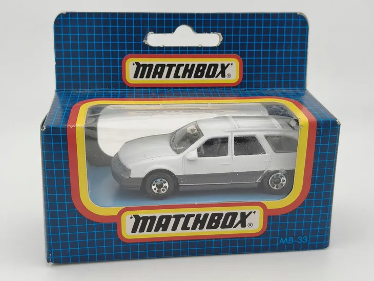 mb33-matchbox-mercury-sable-wagon-blue-grid-box