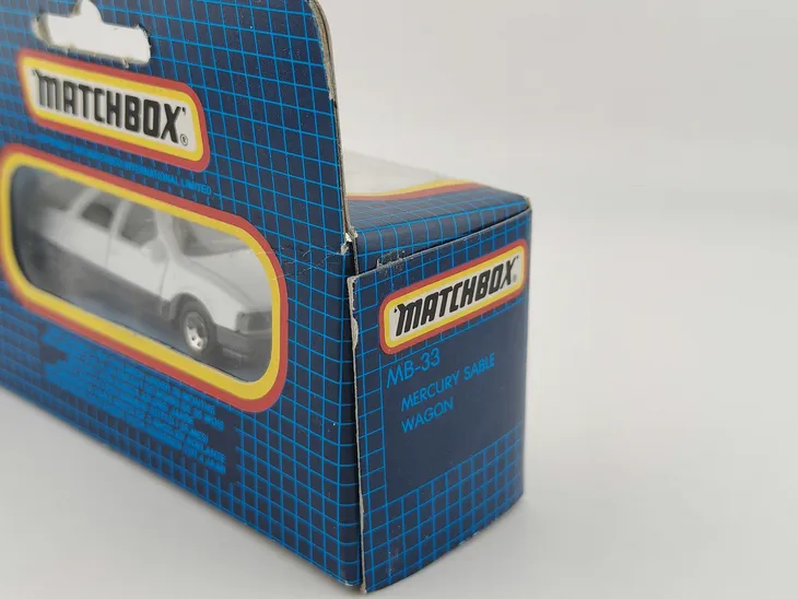mb33-matchbox-mercury-sable-wagon-blue-grid-box-model-mb33-matchbox-mercury-sable-wagon-blue-grid-box