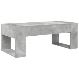 elegancki-stolik-kawowy-w-kolorze-betonowego-szarosci-z-materialow-drewn