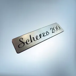 tonsil-scherzo-200-80x20mm-srebrny-emblemat-zamiennik-unitra-naklejka-logo