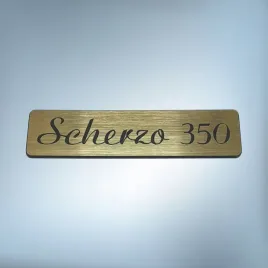 tonsil-scherzo-350-80x20mm-zloty-emblemat-zamiennik-unitra-naklejka-logo