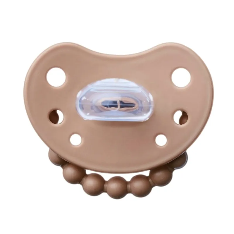 luu-smoczek-pozycjonujacy-6m-milkhazelnut
