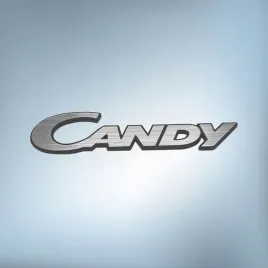 greatergreatergreater-candy-60x13mm-srebrny-emblemat-naklejka-logo-znaczek-zamiennik