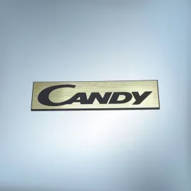 greatergreatergreater-candy-65x16mm-zloty-emblemat-naklejka-logo-znaczek-zamiennik