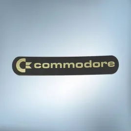 emblemat-naklejka-commodore-zloto-czarna-a-68x13mm-logo-znaczek
