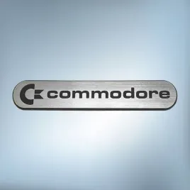 emblemat-naklejka-commodore-srebrna-68x13mm-logo-znaczek