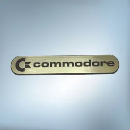 emblemat-naklejka-commodore-zlota-68x13mm-logo-znaczek