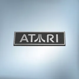 emblemat-naklejka-logo-atari-srebrny-napis-ramka-40x12mm