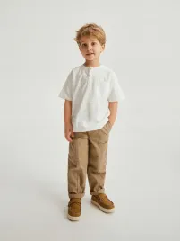 bezowe-spodnie-chino-reserved-110-116