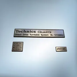 emblemat-naklejka-logo-technics-1210-mk2-ramka-srebrna-91x16mm-komplet