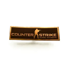 greatergreatergreater-csgo-counter-strike-65x20mm-zloty-emblemat-naklejka-logo