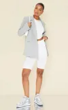biale-prazkowane-spodenki-prettylittlething-l-rodzaj-inny