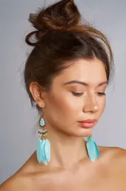 kolczyki-piorka-wiszace-w-stylu-orientalnym-boho