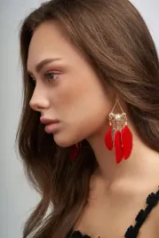 kolczyki-piora-wiszace-z-perelka-orientalne-boho