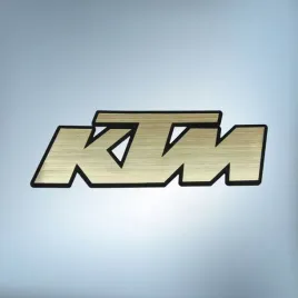 greatergreatergreater-emblemat-ktm-88x30mm-zlota-naklejka-logo-znaczek-symbol-sticker