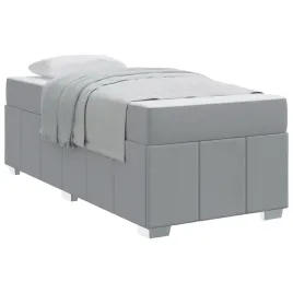 nowoczesne-lozko-box-spring-z-materacem-w-kolorze-jasnoszarym-90x200-cm