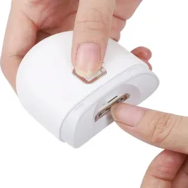 obcinacz-elektryczny-do-paznokci-bialy-z-regulacja-predkosci