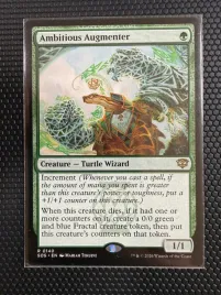 mtg-ambitious-augmenter-0140-rare-or-spongebob-squarepants-sos