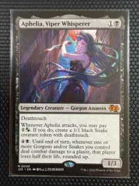 mtg-aphelia-viper-whisperer-0040-mythic-or-jumpstart-2025-j25