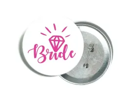 przypinka-biala-z-rozowym-napisem-bride-i-diamentem
