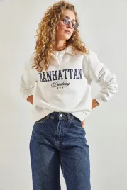 bluza-damska-biala-z-kolnierzykiem-i-nadrukiem-manhattan-l-5ga