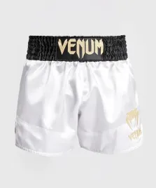 spodenki-tajskie-muay-thai-venum-lekkie-elastyczne-biale-czarne-zlote-r-s