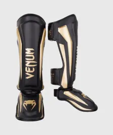 ochraniacze-na-piszczele-venum-elite-muay-thai-kickboxing-czarny-zloty-xl