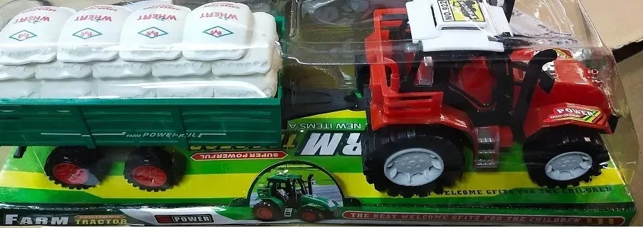 traktor-z-przyczepa-worki