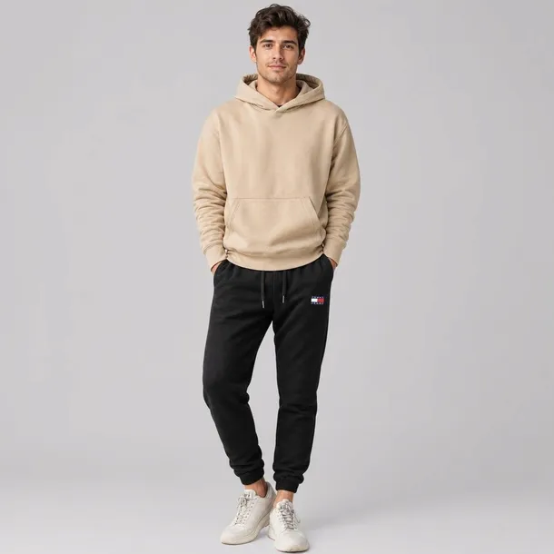 Tommy Jeans spodnie męskie dresowe czarne z haftowanym logo i regularnym krojem rozmiar S | Idealne na jesień!