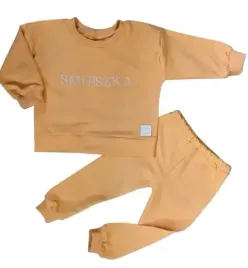 dres-brzoskwiniowy-smieszka-rozmiar-170