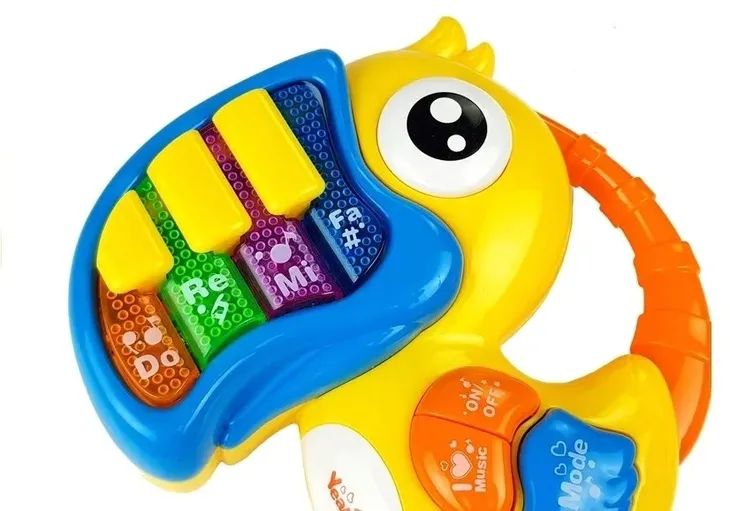 pianinko-do-re-mi-papuga-zolte-glebokosc-produktu-28-cm