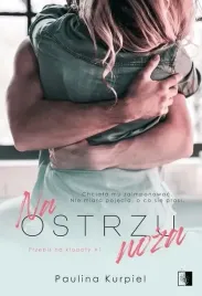 na-ostrzu-noza