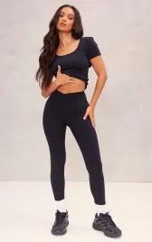 czarne-przylegajace-legginsy-prettylittlething-l