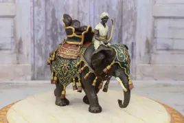 mysliwy-arab-na-sloniu-slon-rzezba-figura-z-brazu-prezent