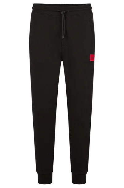 HUGO spodnie dresowe męskie TRACKSUIT BOTTOMS DOAK212 czarny r. M