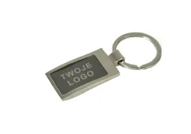 metalowy-brelok-do-kluczy-z-wlasnym-grawerem-logo-5x25cm-50-szt
