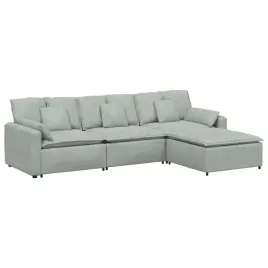 sofa-modulowa-z-podnozkiem-i-poduszkami-jasnoszara
