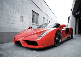 obraz-na-plotnie-canvas-obraz-ferrari-auto-sportowe-widok-krajobraz-100x70