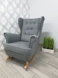 fotel-uszak-na-designerskich-plozach-buja-w-oblokach