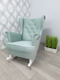 fotel-uszak-na-designerskich-plozach-buja-w-oblokach