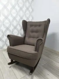 fotel-uszak-na-designerskich-plozach-buja-w-oblokach